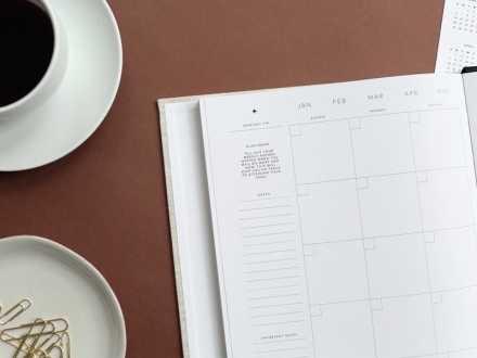 Table with planner and coffee